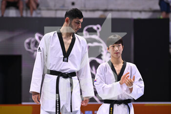 05/06/2022 - Shukhrat SALAEV (UZB) and Woo hyeok PARK (KOR) during the award ceremony -80Kg of World Taekwondo Grand Prix at Foro Italico, Nicola Pietrangeli Stadium, 5th June 2022, Rome, Italy. - 20222 WORLD TAEKWONDO ROMA GRAND PRIX (DAY3) - TAEKWONDO - CONTATTO