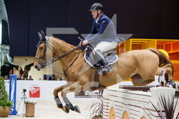 2022-03-18 - Roger-Yves BOST (FRA) riding BALLERINE DU VILPION during the Prix Hermes Sellier at the Saut-Hermes 2022, equestrian FEI event on March 18, 2022 at the ephemeral Grand-palais in Paris, France - SAUT-HERMèS 2022, EQUESTRIAN FEI EVENT  - INTERNATIONALS - EQUESTRIAN
