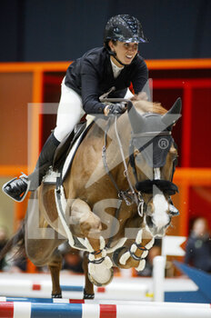 2022-03-18 - Julia DALLAMANO (FRA) riding VARENNES DU BREUIL during the Prix Hermes Sellier at the Saut-Hermes 2022, equestrian FEI event on March 18, 2022 at the ephemeral Grand-palais in Paris, France - SAUT-HERMèS 2022, EQUESTRIAN FEI EVENT  - INTERNATIONALS - EQUESTRIAN