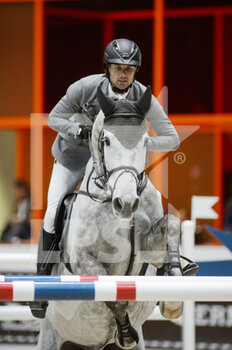 2022-03-18 - Christian KUKUK (GER) riding CHECKER 47 during the Prix Hermes Sellier at the Saut-Hermes 2022, equestrian FEI event on March 18, 2022 at the ephemeral Grand-palais in Paris, France - SAUT-HERMèS 2022, EQUESTRIAN FEI EVENT  - INTERNATIONALS - EQUESTRIAN