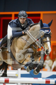 2022-03-18 - Julien ANQUETIN (FRA) riding BLOOD DIAMOND DU PONT during the Prix Hermes Sellier at the Saut-Hermes 2022, equestrian FEI event on March 18, 2022 at the ephemeral Grand-palais in Paris, France - SAUT-HERMèS 2022, EQUESTRIAN FEI EVENT  - INTERNATIONALS - EQUESTRIAN