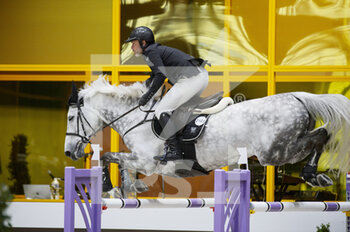 2022-03-18 - Gregory COTTARD (FRA) riding BIBICI during the Prix Hermes Sellier at the Saut-Hermes 2022, equestrian FEI event on March 18, 2022 at the ephemeral Grand-palais in Paris, France - SAUT-HERMèS 2022, EQUESTRIAN FEI EVENT  - INTERNATIONALS - EQUESTRIAN