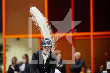 2022-03-18 - Gregory COTTARD (FRA) riding BIBICI during the Prix Hermes Sellier at the Saut-Hermes 2022, equestrian FEI event on March 18, 2022 at the ephemeral Grand-palais in Paris, France - SAUT-HERMèS 2022, EQUESTRIAN FEI EVENT  - INTERNATIONALS - EQUESTRIAN