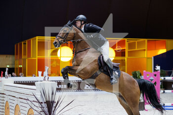 2022-03-18 - Titouan SCHUMACHER (FRA) riding ATOME Z during the Prix Hermes Sellier at the Saut-Hermes 2022, equestrian FEI event on March 18, 2022 at the ephemeral Grand-palais in Paris, France - SAUT-HERMèS 2022, EQUESTRIAN FEI EVENT  - INTERNATIONALS - EQUESTRIAN