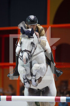 2022-03-19 - Peder FREDRICSON (SWE) riding H&M CRUSADER ICE during the Prix GL Events at the Saut-Hermes 2022, equestrian FEI event on March 19, 2022 at the ephemeral Grand-palais in Paris, France - PRIX GL EVENTS AT THE SAUT-HERMES 2022, EQUESTRIAN FEI EVENT - INTERNATIONALS - EQUESTRIAN