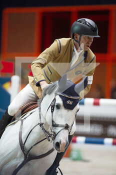 2022-03-19 - Peder FREDRICSON (SWE) riding H&M CRUSADER ICE during the Prix GL Events at the Saut-Hermes 2022, equestrian FEI event on March 19, 2022 at the ephemeral Grand-palais in Paris, France - PRIX GL EVENTS AT THE SAUT-HERMES 2022, EQUESTRIAN FEI EVENT - INTERNATIONALS - EQUESTRIAN