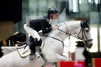 2022-03-19 - Marcus EHNING (GER) riding CALANDA 42 during the Prix GL Events at the Saut-Hermes 2022, equestrian FEI event on March 19, 2022 at the ephemeral Grand-palais in Paris, France - PRIX GL EVENTS AT THE SAUT-HERMES 2022, EQUESTRIAN FEI EVENT - INTERNATIONALS - EQUESTRIAN