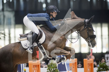 2022-03-19 - Julia DALLAMANO (FRA) riding VARENNES DU BREUIL during the Saut Hermes prize at the Saut-Hermes 2022, equestrian FEI event on March 19, 2022 at the ephemeral Grand-palais in Paris, France - PRIX GL EVENTS AT THE SAUT-HERMES 2022, EQUESTRIAN FEI EVENT - INTERNATIONALS - EQUESTRIAN