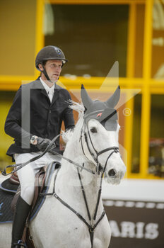 2022-03-19 - Kevin STAUT (FRA) riding TOLEDE DE MESCAM HARCOUR during the Saut Hermes prize at the Saut-Hermes 2022, equestrian FEI event on March 19, 2022 at the ephemeral Grand-palais in Paris, France - PRIX GL EVENTS AT THE SAUT-HERMES 2022, EQUESTRIAN FEI EVENT - INTERNATIONALS - EQUESTRIAN