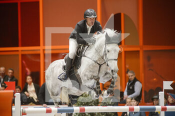 2022-03-19 - Gregory COTTARD (FRA) riding BIBICI during the Saut Hermes prize at the Saut-Hermes 2022, equestrian FEI event on March 19, 2022 at the ephemeral Grand-palais in Paris, France - PRIX GL EVENTS AT THE SAUT-HERMES 2022, EQUESTRIAN FEI EVENT - INTERNATIONALS - EQUESTRIAN