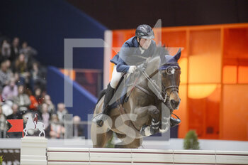 2022-03-19 - Martin FUCHS (SUI) riding THE SINNER during the Saut Hermes prize at the Saut-Hermes 2022, equestrian FEI event on March 19, 2022 at the ephemeral Grand-palais in Paris, France - PRIX GL EVENTS AT THE SAUT-HERMES 2022, EQUESTRIAN FEI EVENT - INTERNATIONALS - EQUESTRIAN