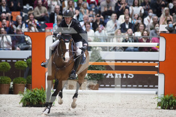 2022-03-19 - Kevin STAUT (FRA) riding CHEPPETTA during the Grand Prix Hermes at the Saut-Hermes 2022, equestrian FEI event on March 20, 2022 at the ephemeral Grand-palais in Paris, France - PRIX GL EVENTS AT THE SAUT-HERMES 2022, EQUESTRIAN FEI EVENT - INTERNATIONALS - EQUESTRIAN