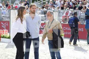 2022-06-24 - Camille Cerf and his boyfriend with Olivier Robert during the Longines Global Champions Tour 2022, Paris Eiffel Jumping, equestrian event on June 24, 2022 at Champ de Mars in Paris, France - EQUESTRIAN - LONGINES GLOBAL CHAMPIONS TOUR 2022 - PARIS EIFFEL JUMPING - INTERNATIONALS - EQUESTRIAN