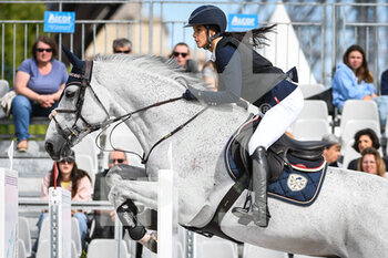 2022-06-26 - Monica MCCOURT of United States riding RMF Utah Beach Un Prince during the Longines Global Champions Tour 2022, Paris Eiffel Jumping, equestrian event on June 26, 2022 at Champ de Mars in Paris, France - EQUESTRIAN - LONGINES GLOBAL CHAMPIONS TOUR 2022 - PARIS EIFFEL JUMPING - INTERNATIONALS - EQUESTRIAN