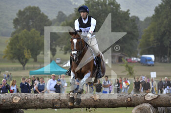 2022-09-17 - William Coleman (USA) riding Off the record during the cross-country course of the Equestrian FEI Eventing World Championships on September 17, 2022 at Pratoni del Vivaro, Rome, Italy - FEI EVENTING WORLD CHAMPIONSHIPS - INTERNATIONALS - EQUESTRIAN