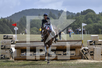 17/09/2022 - Thomas Carlile (FRA) riding Darmagnac de Beliard during the cross-country course of the Equestrian FEI Eventing World Championships on September 17, 2022 at Pratoni del Vivaro, Rome, Italy - FEI EVENTING WORLD CHAMPIONSHIPS - INTERNAZIONALI - EQUITAZIONE