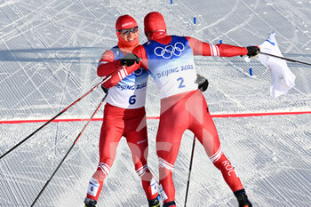06/02/2022 - Denis Spitsov (ROC) Silver Medal celebrates with Alexander Bolshunov (ROC) Gold Medal during the Olympic Winter Games Beijing 2022, Cross-Country Skiing, Men's 15km + 15km Skiathlon on February 6, 2022 at Zhangjiakou National Cross-Country Skiing Centre in Zhangjiakou, China - OLYMPIC WINTER GAMES BEIJING 2022, FEBRUARY 06 - OLIMPIADI INVERNALI BEIJING 2022 - GIOCHI OLIMPICI