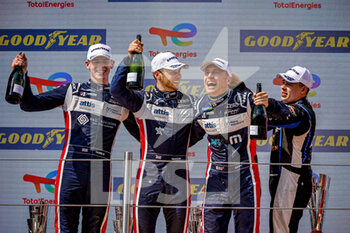 2022-05-15 - GAMBLE Tom (gbr), United Autosports, Oreca 07 - Gibson, portrait, HANSON Philip (gbr), United Autosports, Oreca 07 - Gibson, portrait, TAPPY Duncan (gbr), United Autosports, Oreca 07 - Gibson, portrait Podium during the 4 Hours of Imola 2022, 2nd round of the 2022 European Le Mans Series on the Imola Circuit from May 12 to 15, in Imola, Italy - 4 HOURS OF IMOLA 2022, 2ND ROUND OF THE 2022 EUROPEAN LE MANS SERIES - ENDURANCE - MOTORS