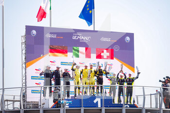 2022-07-03 - 57 Jensen Mikkel (dnk), Kimura Takeshi (jpn), SCHANDORFF Frederik (dnk), Car Guy Racing, Ferrari 488 GTE, 77 BRUNI Gianmaria (ita), FERRARI Lorenzo (ita), RIED Christian (ger), Proton Competition, Porsche 911 RSR-19, 60 CRESSONI Matteo (ita), RIGON Davide (ita), SCHIAVONI Claudio (ita), Iron Lynx, Ferrari 488 GTE, podium during the 4 Hours of Monza 2022, 3rd round of the 2022 European Le Mans Series on the Autodromo Nazionale di Monza from July 1 to 3, in Monza, Italy - AUTO - ELMS - 4 HOURS OF MONZA 2022 - ENDURANCE - MOTORS