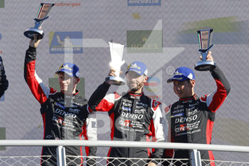 2022-07-10 - 07 CONWAY Mike (gbr), KOBAYASHI Kamui (jpn), LOPEZ Jose Maria (arg), Toyota Gazoo Racing, Toyota GR010 - Hybrid, podium , during the 6 Hours of Monza 2022, 4th round of the 2022 FIA World Endurance Championship on the Autodromo Nazionale di Monza from July 8 to 10, 2022 in Monza, Italy - AUTO - FIA WEC - 6 HOURS OF MONZA 2022 - ENDURANCE - MOTORS