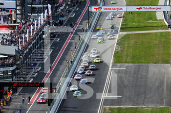 2022-07-30 - Start of the race: 54 Dinamic Motorsport, Porsche 911 GT3-R of Klaus BACHLER, Come LEDOGAR, Matteo CAIROLI, 88 AMG Team AKKODIS ASP, Mercedes-AMG GT3 of Raffaele MARCIELLO, Daniel JUNCADELLA, Jules GOUNON, in action during the TotalEnergies 24 hours of Spa 2022, 7th round of the 2022 Fanatec GT World Challenge Europe Powered by AWS, from July 27 to 31, 2021 on the Circuit de Spa-Francorchamps, in Stavelot, Belgium - AUTO - 24 HOURS OF SPA 2022 - ENDURANCE - MOTORS