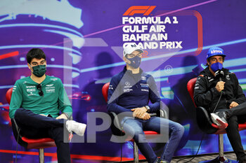 2022-03-18 - STROLL Lance (can), Aston Martin F1 Team AMR22, portrait LATIFI Nicholas (can), Williams Racing FW44, portrait ALONSO Fernando (spa), Alpine F1 Team A522, portrait press conference during the Formula 1 Gulf Air Bahrain Grand Prix 2022, 1st round of the 2022 FIA Formula One World Championship, on the Bahrain International Circuit, from March 18 to 20, 2022 in Sakhir, Bahrain - FORMULA 1 GULF AIR BAHRAIN GRAND PRIX 2022, 1ST ROUND OF THE 2022 FIA FORMULA ONE WORLD CHAMPIONSHIP - FORMULA 1 - MOTORS