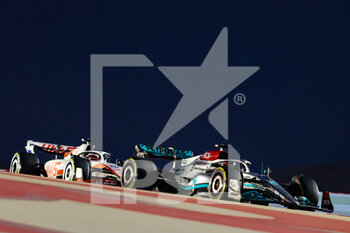 2022-03-18 - 63 RUSSELL George (gbr), Mercedes AMG F1 Team W13, MAGNUSSEN Kevin (den), Haas F1 Team VF-22 Ferrari, action during the Formula 1 Gulf Air Bahrain Grand Prix 2022, 1st round of the 2022 FIA Formula One World Championship, on the Bahrain International Circuit, from March 18 to 20, 2022 in Sakhir, Bahrain - FORMULA 1 GULF AIR BAHRAIN GRAND PRIX 2022, 1ST ROUND OF THE 2022 FIA FORMULA ONE WORLD CHAMPIONSHIP - FORMULA 1 - MOTORS