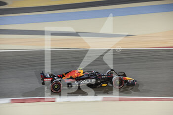 2022-03-18 - 11 PEREZ Sergio (mex), Red Bull Racing RB18, action during the Formula 1 Gulf Air Bahrain Grand Prix 2022, 1st round of the 2022 FIA Formula One World Championship, on the Bahrain International Circuit, from March 18 to 20, 2022 in Sakhir, Bahrain - FORMULA 1 GULF AIR BAHRAIN GRAND PRIX 2022, 1ST ROUND OF THE 2022 FIA FORMULA ONE WORLD CHAMPIONSHIP - FORMULA 1 - MOTORS