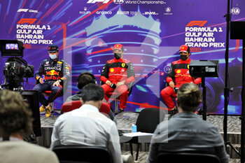 2022-03-19 - LECLERC Charles (mco), Scuderia Ferrari F1-75, portrait VERSTAPPEN Max (ned), Red Bull Racing RB18, portrait SAINZ Carlos (spa), Scuderia Ferrari F1-75, portrait during the Formula 1 Gulf Air Bahrain Grand Prix 2022, 1st round of the 2022 FIA Formula One World Championship, on the Bahrain International Circuit, from March 18 to 20, 2022 in Sakhir, Bahrain - FORMULA 1 GULF AIR BAHRAIN GRAND PRIX 2022, 1ST ROUND OF THE 2022 FIA FORMULA ONE WORLD CHAMPIONSHIP - FORMULA 1 - MOTORS