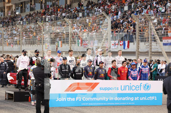 2022-03-20 - Pilotes drivers pose for Unicef during the Formula 1 Gulf Air Bahrain Grand Prix 2022, 1st round of the 2022 FIA Formula One World Championship, on the Bahrain International Circuit, from March 18 to 20, 2022 in Sakhir, Bahrain - FORMULA 1 GULF AIR BAHRAIN GRAND PRIX 2022, 1ST ROUND OF THE 2022 FIA FORMULA ONE WORLD CHAMPIONSHIP - FORMULA 1 - MOTORS