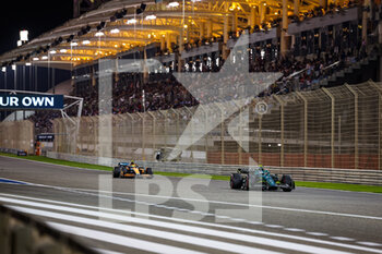 2022-03-20 - 27 HULKENBERG Nico (ger), Aston Martin F1 Team AMR22, 04 NORRIS Lando (gbr), McLaren F1 Team MCL36, action during the Formula 1 Gulf Air Bahrain Grand Prix 2022, 1st round of the 2022 FIA Formula One World Championship, on the Bahrain International Circuit, from March 18 to 20, 2022 in Sakhir, Bahrain - FORMULA 1 GULF AIR BAHRAIN GRAND PRIX 2022, 1ST ROUND OF THE 2022 FIA FORMULA ONE WORLD CHAMPIONSHIP - FORMULA 1 - MOTORS