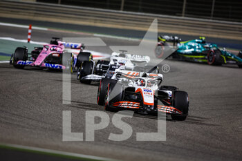 2022-03-20 - MAGNUSSEN Kevin (den), Haas F1 Team VF-22 Ferrari, 10 GASLY Pierre (fra), Scuderia AlphaTauri AT03, action during the Formula 1 Gulf Air Bahrain Grand Prix 2022, 1st round of the 2022 FIA Formula One World Championship, on the Bahrain International Circuit, from March 18 to 20, 2022 in Sakhir, Bahrain - FORMULA 1 GULF AIR BAHRAIN GRAND PRIX 2022, 1ST ROUND OF THE 2022 FIA FORMULA ONE WORLD CHAMPIONSHIP - FORMULA 1 - MOTORS