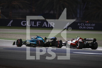 2022-03-20 - 18 STROLL Lance (can), Aston Martin F1 Team AMR22, action 24 ZHOU Guanyu (chi), Alfa Romeo F1 Team ORLEN C42, action during the Formula 1 Gulf Air Bahrain Grand Prix 2022, 1st round of the 2022 FIA Formula One World Championship, on the Bahrain International Circuit, from March 18 to 20, 2022 in Sakhir, Bahrain - FORMULA 1 GULF AIR BAHRAIN GRAND PRIX 2022, 1ST ROUND OF THE 2022 FIA FORMULA ONE WORLD CHAMPIONSHIP - FORMULA 1 - MOTORS