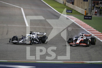 2022-03-20 - 10 GASLY Pierre (fra), Scuderia AlphaTauri AT03, action 20 MAGNUSSEN Kevin (den), Haas F1 Team VF-22 Ferrari, action during the Formula 1 Gulf Air Bahrain Grand Prix 2022, 1st round of the 2022 FIA Formula One World Championship, on the Bahrain International Circuit, from March 18 to 20, 2022 in Sakhir, Bahrain - FORMULA 1 GULF AIR BAHRAIN GRAND PRIX 2022, 1ST ROUND OF THE 2022 FIA FORMULA ONE WORLD CHAMPIONSHIP - FORMULA 1 - MOTORS