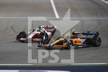 2022-03-20 - 47 SCHUMACHER Mick (ger), Haas F1 Team VF-22 Ferrari, action 04 NORRIS Lando (gbr), McLaren F1 Team MCL36, action during the Formula 1 Gulf Air Bahrain Grand Prix 2022, 1st round of the 2022 FIA Formula One World Championship, on the Bahrain International Circuit, from March 18 to 20, 2022 in Sakhir, Bahrain - FORMULA 1 GULF AIR BAHRAIN GRAND PRIX 2022, 1ST ROUND OF THE 2022 FIA FORMULA ONE WORLD CHAMPIONSHIP - FORMULA 1 - MOTORS