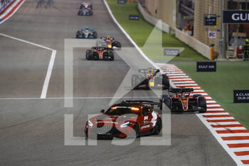 2022-03-20 - Safety car followd by 16 LECLERC Charles (mco), Scuderia Ferrari F1-75, action 01 VERSTAPPEN Max (nld), Red Bull Racing RB18, action during the Formula 1 Gulf Air Bahrain Grand Prix 2022, 1st round of the 2022 FIA Formula One World Championship, on the Bahrain International Circuit, from March 18 to 20, 2022 in Sakhir, Bahrain - FORMULA 1 GULF AIR BAHRAIN GRAND PRIX 2022, 1ST ROUND OF THE 2022 FIA FORMULA ONE WORLD CHAMPIONSHIP - FORMULA 1 - MOTORS