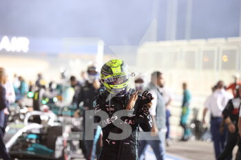 2022-03-20 - HAMILTON Lewis (gbr), Mercedes AMG F1 Team W13, portrait celebrates his third place during the Formula 1 Gulf Air Bahrain Grand Prix 2022, 1st round of the 2022 FIA Formula One World Championship, on the Bahrain International Circuit, from March 18 to 20, 2022 in Sakhir, Bahrain - FORMULA 1 GULF AIR BAHRAIN GRAND PRIX 2022, 1ST ROUND OF THE 2022 FIA FORMULA ONE WORLD CHAMPIONSHIP - FORMULA 1 - MOTORS
