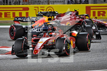 2022-03-20 - LECLERC Charles (mco), Scuderia Ferrari F1-75, VERSTAPPEN Max (ned), Red Bull Racing RB18, SAINZ Carlos (spa), Scuderia Ferrari F1-75, action during the Formula 1 Gulf Air Bahrain Grand Prix 2022, 1st round of the 2022 FIA Formula One World Championship, on the Bahrain International Circuit, from March 18 to 20, 2022 in Sakhir, Bahrain - FORMULA 1 GULF AIR BAHRAIN GRAND PRIX 2022, 1ST ROUND OF THE 2022 FIA FORMULA ONE WORLD CHAMPIONSHIP - FORMULA 1 - MOTORS