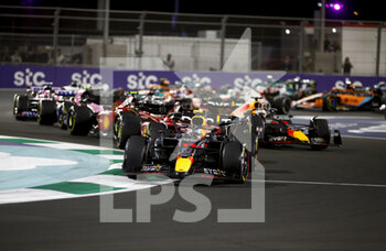 2022-03-27 - 11 PEREZ Sergio (mex), Red Bull Racing RB18, action start of the race, depart, during the Formula 1 STC Saudi Arabian Grand Prix 2022, 2nd round of the 2022 FIA Formula One World Championship, on the Jeddah Corniche Circuit, from March 25 to 27, 2022 in Jeddah, Saudi Arabia - FORMULA 1 STC SAUDI ARABIAN GRAND PRIX 2022, 2ND ROUND OF THE 2022 FIA FORMULA ONE WORLD CHAMPIONSHIP - FORMULA 1 - MOTORS