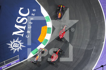2022-03-27 - Start of the race, 11 PEREZ Sergio (mex), Red Bull Racing RB18, 16 LECLERC Charles (mco), Scuderia Ferrari F1-75, action during the Formula 1 STC Saudi Arabian Grand Prix 2022, 2nd round of the 2022 FIA Formula One World Championship, on the Jeddah Corniche Circuit, from March 25 to 27, 2022 in Jeddah, Saudi Arabia - FORMULA 1 STC SAUDI ARABIAN GRAND PRIX 2022, 2ND ROUND OF THE 2022 FIA FORMULA ONE WORLD CHAMPIONSHIP - FORMULA 1 - MOTORS