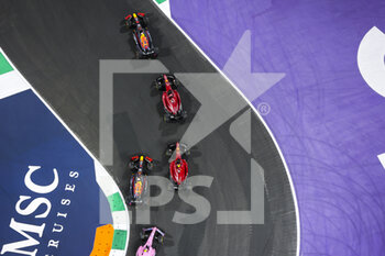 2022-03-27 - Start of the race, 11 PEREZ Sergio (mex), Red Bull Racing RB18, 16 LECLERC Charles (mco), Scuderia Ferrari F1-75, action during the Formula 1 STC Saudi Arabian Grand Prix 2022, 2nd round of the 2022 FIA Formula One World Championship, on the Jeddah Corniche Circuit, from March 25 to 27, 2022 in Jeddah, Saudi Arabia - FORMULA 1 STC SAUDI ARABIAN GRAND PRIX 2022, 2ND ROUND OF THE 2022 FIA FORMULA ONE WORLD CHAMPIONSHIP - FORMULA 1 - MOTORS