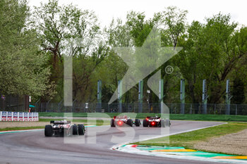 2022-04-24 - 63 RUSSELL George (gbr), Mercedes AMG F1 Team W13, 20 MAGNUSSEN Kevin (den), Haas F1 Team VF-22 Ferrari, action during the Formula 1 Grand Premio del Made in Italy e dell'Emilia-Romagna 2022, 4th round of the 2022 FIA Formula One World Championship, on the Imola Circuit, from April 22 to 24, 2022 in Imola, Italy - FORMULA 1 GRAND PREMIO DEL MADE IN ITALY E DELL'EMILIA-ROMAGNA 2022, 4TH ROUND OF THE 2022 FIA FORMULA ONE WORLD CHAMPIONSHIP - FORMULA 1 - MOTORS