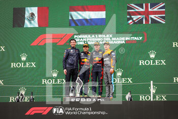 2022-04-24 - Podium: VERSTAPPEN Max (ned), Red Bull Racing RB18, PEREZ Sergio (mex), Red Bull Racing RB18, NORRIS Lando (gbr), McLaren F1 Team MCL36, portrait during the Formula 1 Grand Premio del Made in Italy e dell'Emilia-Romagna 2022, 4th round of the 2022 FIA Formula One World Championship, on the Imola Circuit, from April 22 to 24, 2022 in Imola, Italy - FORMULA 1 GRAND PREMIO DEL MADE IN ITALY E DELL'EMILIA-ROMAGNA 2022, 4TH ROUND OF THE 2022 FIA FORMULA ONE WORLD CHAMPIONSHIP - FORMULA 1 - MOTORS