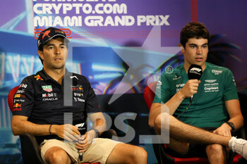 2022-05-06 - STROLL Lance (can), Aston Martin F1 Team AMR22, portrait with PEREZ Sergio (mex), Red Bull Racing RB18 in the FIA Press Conference during the Formula 1 Crypto.com Miami Grand Prix 2022, 5th round of the 2022 FIA Formula One World Championship, on the Miami International Autodrome, from May 6 to 8, 2022 in Miami Gardens, Florida, United States of America - FORMULA 1 CRYPTO.COM MIAMI GRAND PRIX 2022, 5TH ROUND OF THE 2022 FIA FORMULA ONE WORLD CHAMPIONSHIP - FORMULA 1 - MOTORS