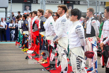 2022-05-08 - F1 drivers during the US hymn during the Formula 1 Crypto.com Miami Grand Prix 2022, 5th round of the 2022 FIA Formula One World Championship, on the Miami International Autodrome, from May 6 to 8, 2022 in Miami Gardens, Florida, United States of America - FORMULA 1 CRYPTO.COM MIAMI GRAND PRIX 2022, 5TH ROUND OF THE 2022 FIA FORMULA ONE WORLD CHAMPIONSHIP - FORMULA 1 - MOTORS