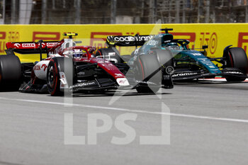 2022-05-22 - 24 ZHOU Guanyu (chi), Alfa Romeo F1 Team ORLEN C42, action 18 STROLL Lance (can), Aston Martin F1 Team AMR22, action during the Formula 1 Pirelli Grand Premio de Espana 2022, 6th round of the 2022 FIA Formula One World Championship, on the Circuit de Barcelona-Catalunya, from May 20 to 22, 2022 in Montmelo, Spain - FORMULA 1 PIRELLI GRAND PREMIO DE ESPANA 2022, 6TH ROUND OF THE 2022 FIA FORMULA ONE WORLD CHAMPIONSHIP - FORMULA 1 - MOTORS