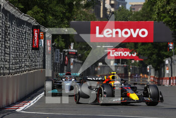 2022-06-12 - 11 PEREZ Sergio (mex), Red Bull Racing RB18, 63 RUSSELL George (gbr), Mercedes AMG F1 Team W13, action during the Formula 1 Azerbaijan Grand Prix 2022, 8th round of the 2022 FIA Formula One World Championship, on the Baku City Circuit, from June 10 to 12, 2022 in Baku, Azerbaijan - F1 - AZERBAIJAN GRAND PRIX 2022 - RACE - FORMULA 1 - MOTORS