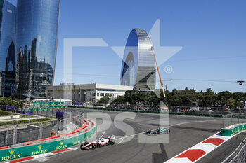 2022-06-12 - 20 MAGNUSSEN Kevin (den), Haas F1 Team VF-22 Ferrari, action 18 STROLL Lance (can), Aston Martin F1 Team AMR22, action during the Formula 1 Azerbaijan Grand Prix 2022, 8th round of the 2022 FIA Formula One World Championship, on the Baku City Circuit, from June 10 to 12, 2022 in Baku, Azerbaijan - F1 - AZERBAIJAN GRAND PRIX 2022 - RACE - FORMULA 1 - MOTORS