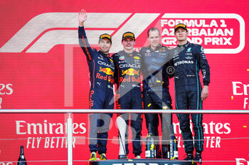 2022-06-12 - Podium: VERSTAPPEN Max (ned), Red Bull Racing RB18, PEREZ Sergio (mex), Red Bull Racing RB18, RUSSELL George (gbr), Mercedes AMG F1 Team W13, portrait during the Formula 1 Azerbaijan Grand Prix 2022, 8th round of the 2022 FIA Formula One World Championship, on the Baku City Circuit, from June 10 to 12, 2022 in Baku, Azerbaijan - F1 - AZERBAIJAN GRAND PRIX 2022 - RACE - FORMULA 1 - MOTORS