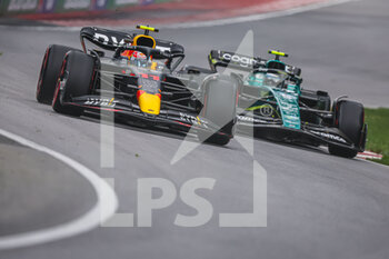 2022-06-17 - 11 PEREZ Sergio (mex), Red Bull Racing RB18, action 05 VETTEL Sebastian (ger), Aston Martin F1 Team AMR22, action during the Formula 1 AWS Grand Prix du Canada 2022, 9th round of the 2022 FIA Formula One World Championship, on the Circuit Gilles Villeneuve, from June 17 to 19, 2022 in Montreal, Canada - F1 - CANADIAN GRAND PRIX 2022 - FORMULA 1 - MOTORS